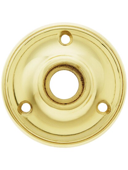 2 1/4 inch Cast Brass Rosette With 21/32 inch Collar in Polished Brass.